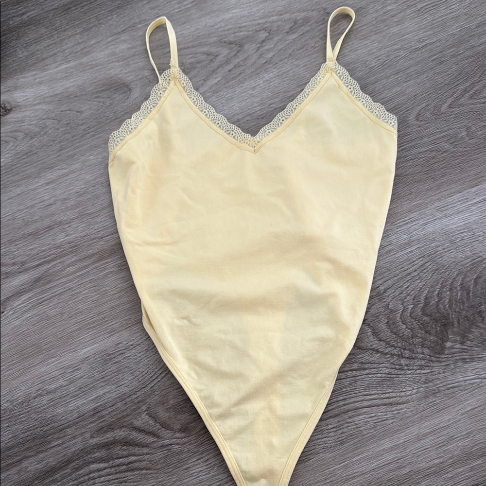 Yellow Lace-Trimmed Bodysuit